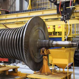 Turbine being worked on in an industrial manufacturing factory